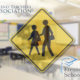 Composite of FTA and Fresno Unified logos with a children walking to school warning sign