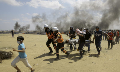 Palestinian medics evacuate victims