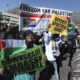 Protesters take part in a march to parliament in Cape Town, South Africa, Tuesday, May 15, 2018