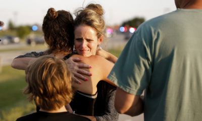 Jennifer Stong hugs Tasha Hunt .