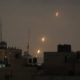 Flames from Palestinian rockets seen over the Gaza Strip