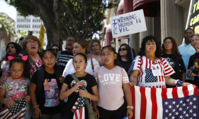 Photo of children protesting separated families in Los Angeles