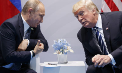 AP picture of Vladimir Putin, left, and Donald Trump