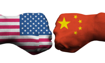 Boxing gloves featuring U.S., left, and China flags