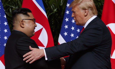 Photo of North Korea's Kim Jong Un and President Trump shaking hands