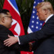 Photo of North Korea's Kim Jong Un and President Trump shaking hands