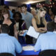 Job applicants talk with hiring rerpresentatives