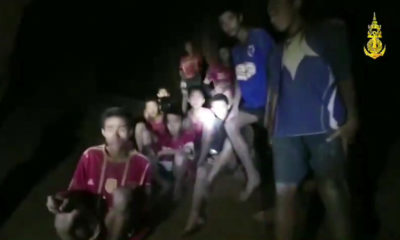 Photo of Thai soccer boys and their coach in the cave