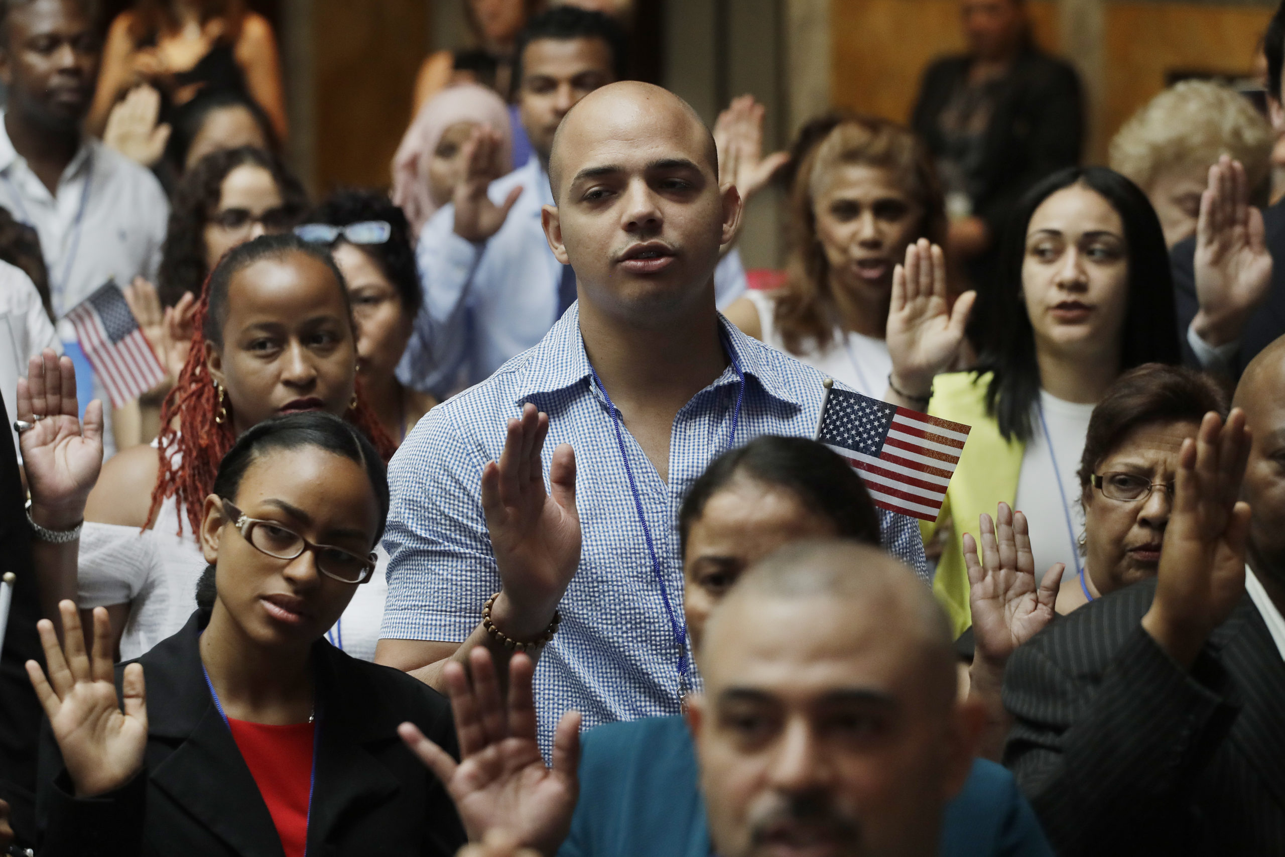 Photo of new American citizens at a naturalization ceremony