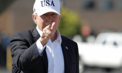 Photo of President Trump wearing white USA hat