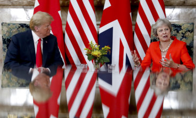 Photo of Donald Trump and Theresa May