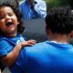 Child reuniting with his father after being released from ICE