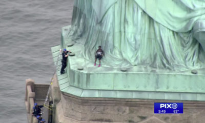 Photo of the base of the Statue of Liberty, where a woman protester tried to climb