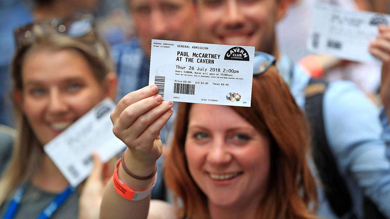 Photo of fans outside the Cavern Club waiting for Paul McCartney