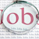 Illustration of the word "Jobs" under a magnifying glass