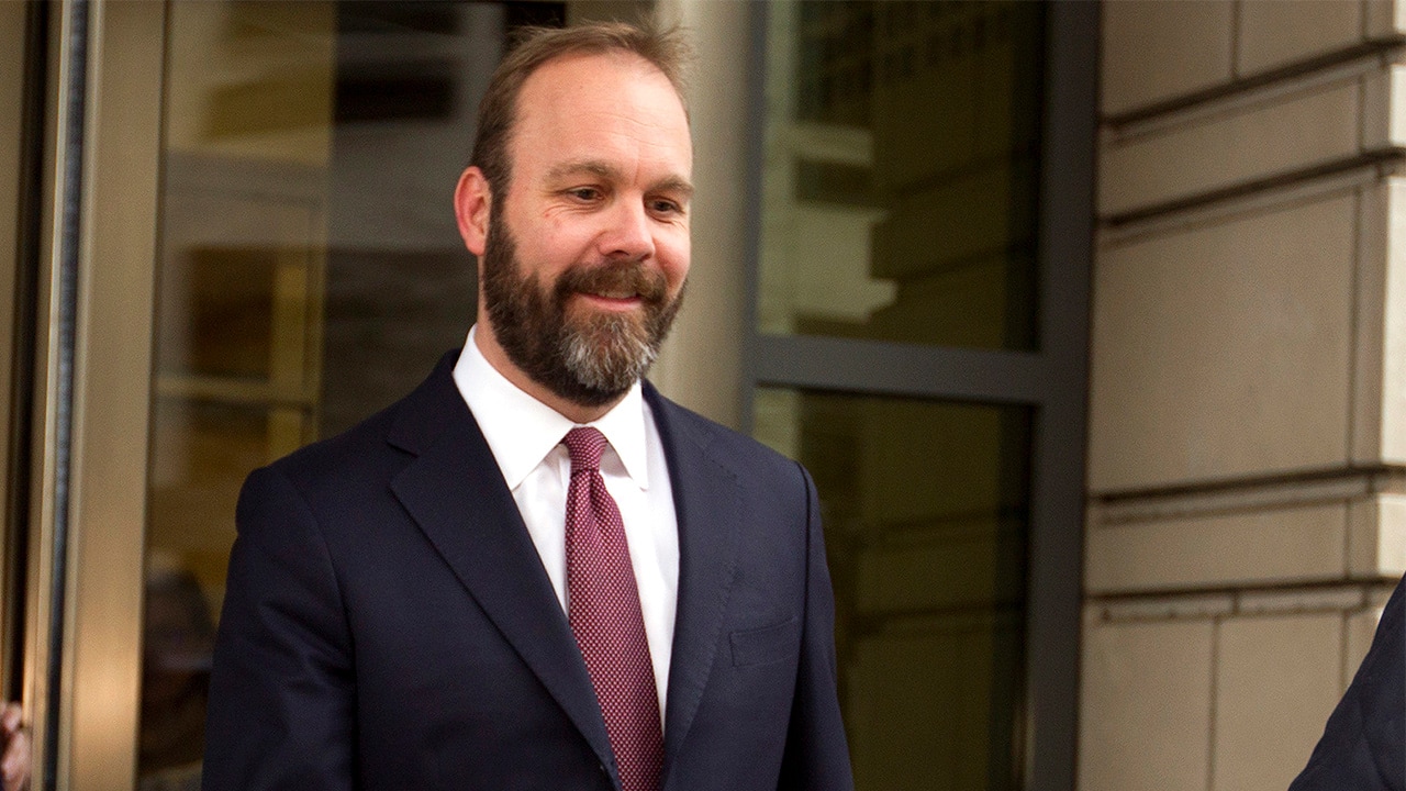 File photo of Rick Gates leaving federal court in Feb. 2018