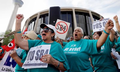 Photo of a group protesting against a new sanctuary cities
