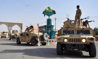 Photo of Afghan security personnel patrol in the city of Ghazni province