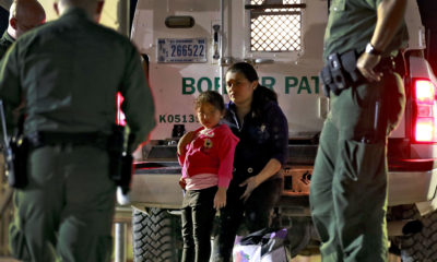 Photo of mother and daughter from Honduras detained at the U.S. border.