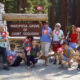 Photo of French tourists in front of the Mariposa Grove at Yosemite National Park