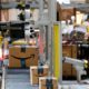 Photo of Amazon packages passing through a scanner at an Amazon fulfillment center in Baltimore