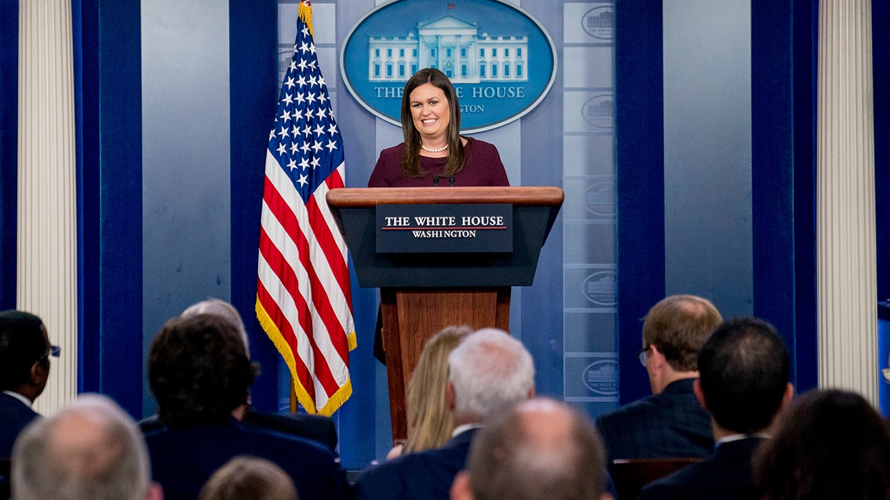 Photo of Sarah Huckabee Sanders speaking during press brief at the White House