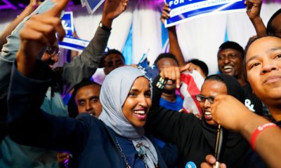 Photo of Minnesota Rep. Ilhan Omar celebrating with her supporters