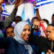 Photo of Minnesota Rep. Ilhan Omar celebrating with her supporters