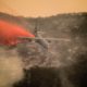 Photo of C 1 30 aircraft dropping flame retardant over Santa Barbara fire in 2017