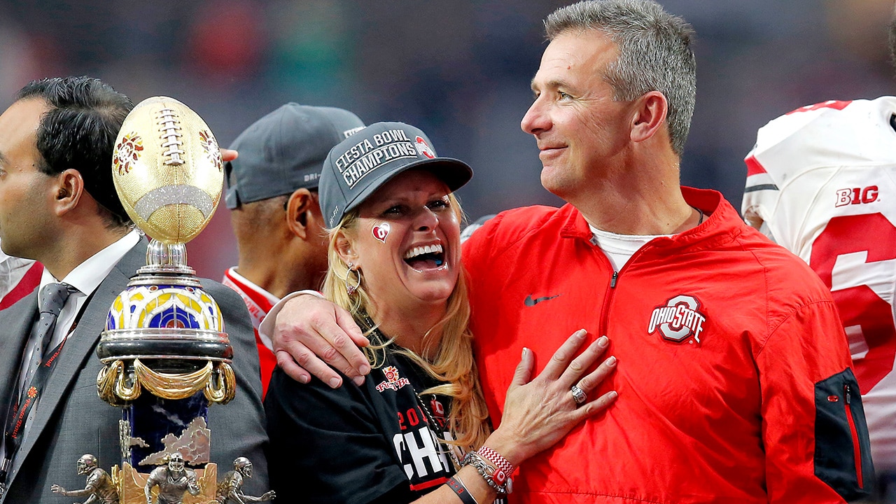 Photo of Urban Meyer and his wife, Shelley Meyer