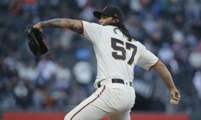 Photo of SF Giants pitcher Dereck Rodriguez in his windup