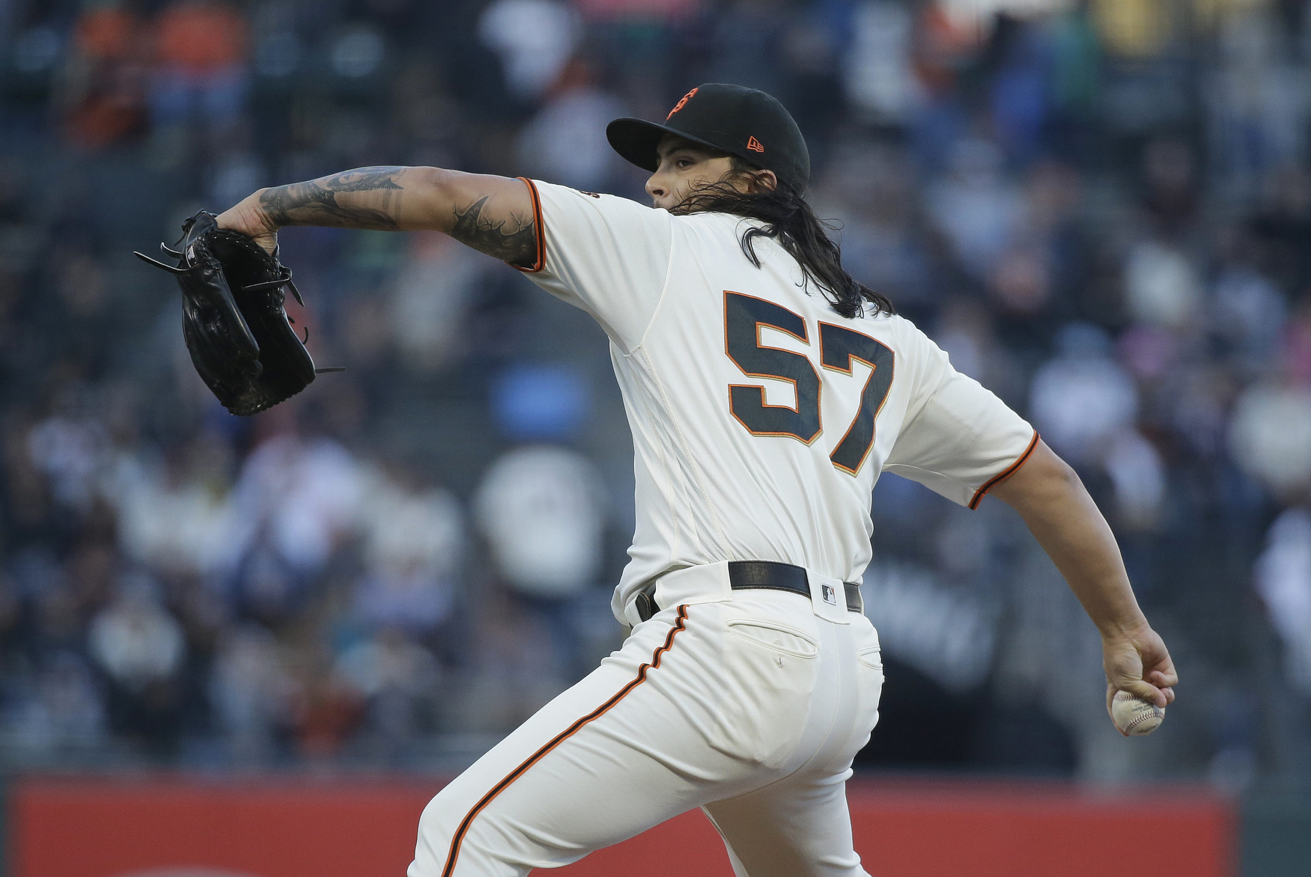 Photo of SF Giants pitcher Dereck Rodriguez in his windup