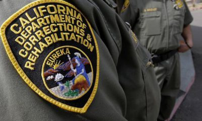 Photo of California Department of Corrections patch on correctional officer's uniform