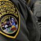 Photo of California Department of Corrections patch on correctional officer's uniform