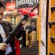 Photo of accessories manufacturer Kevin Kao examining a military grade Remington Adaptive Combat Rifle
