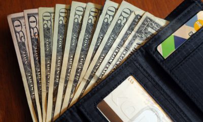 Photo of cash and a wallet