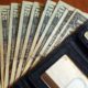 Photo of cash and a wallet