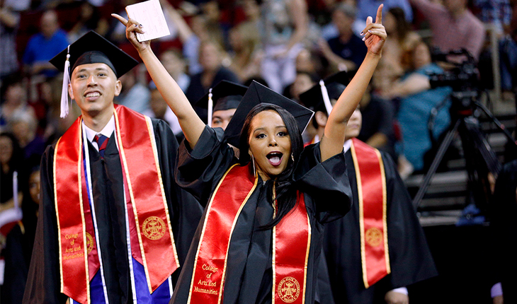 Photo of Fresno State grads celebrating