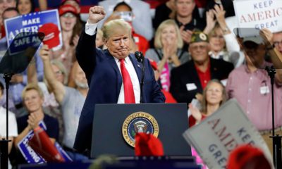 Photo of President Donald Trump acknowledges a crowd at a rally