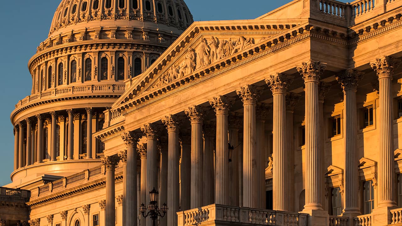 Photo of the Capitol at sunrise in Washington
