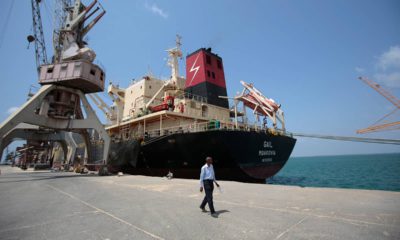 Photo of a cargo ship is docked at the port, in Hodeida, Yemen.