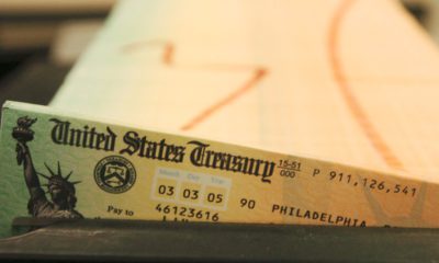 Photo of trays of printed social security checks