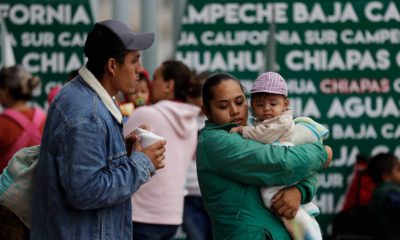 Photo of migrants waiting at the Mexico border