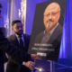 Photo of Ahmed Bedier setting up an image of Jamal Khashoggi