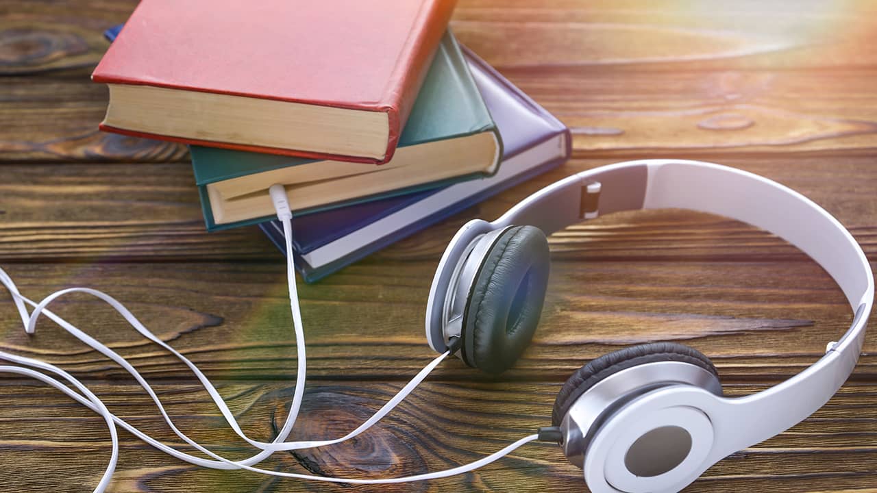 Photo of books and headphones