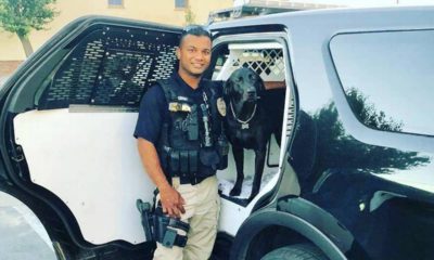 Photo of Newman, California, police officer Ronil Singh standing next to his patrol car