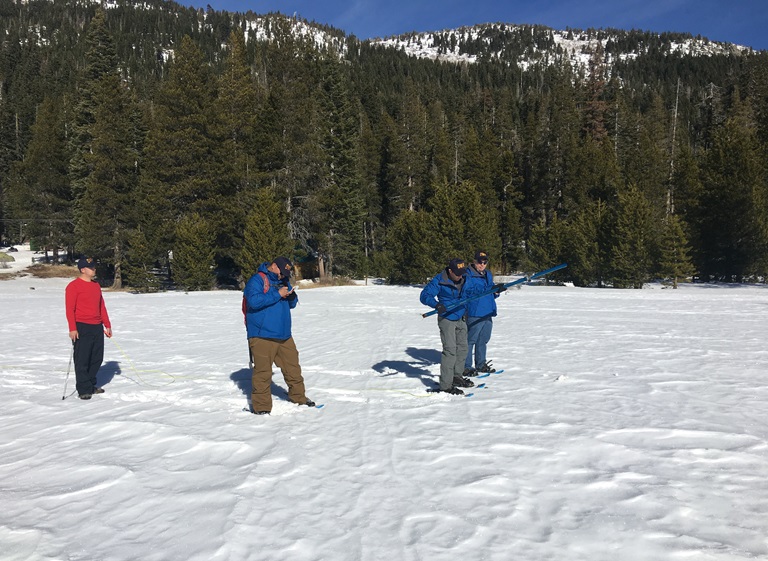 Photo of first Sierra snowpack measurement of 2019
