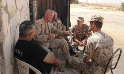 Photo of Marine officer Terry Slatic with his troops in Afghanistan