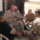 Photo of Marine officer Terry Slatic with his troops in Afghanistan