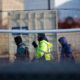 Photo of teen migrants walking in a line